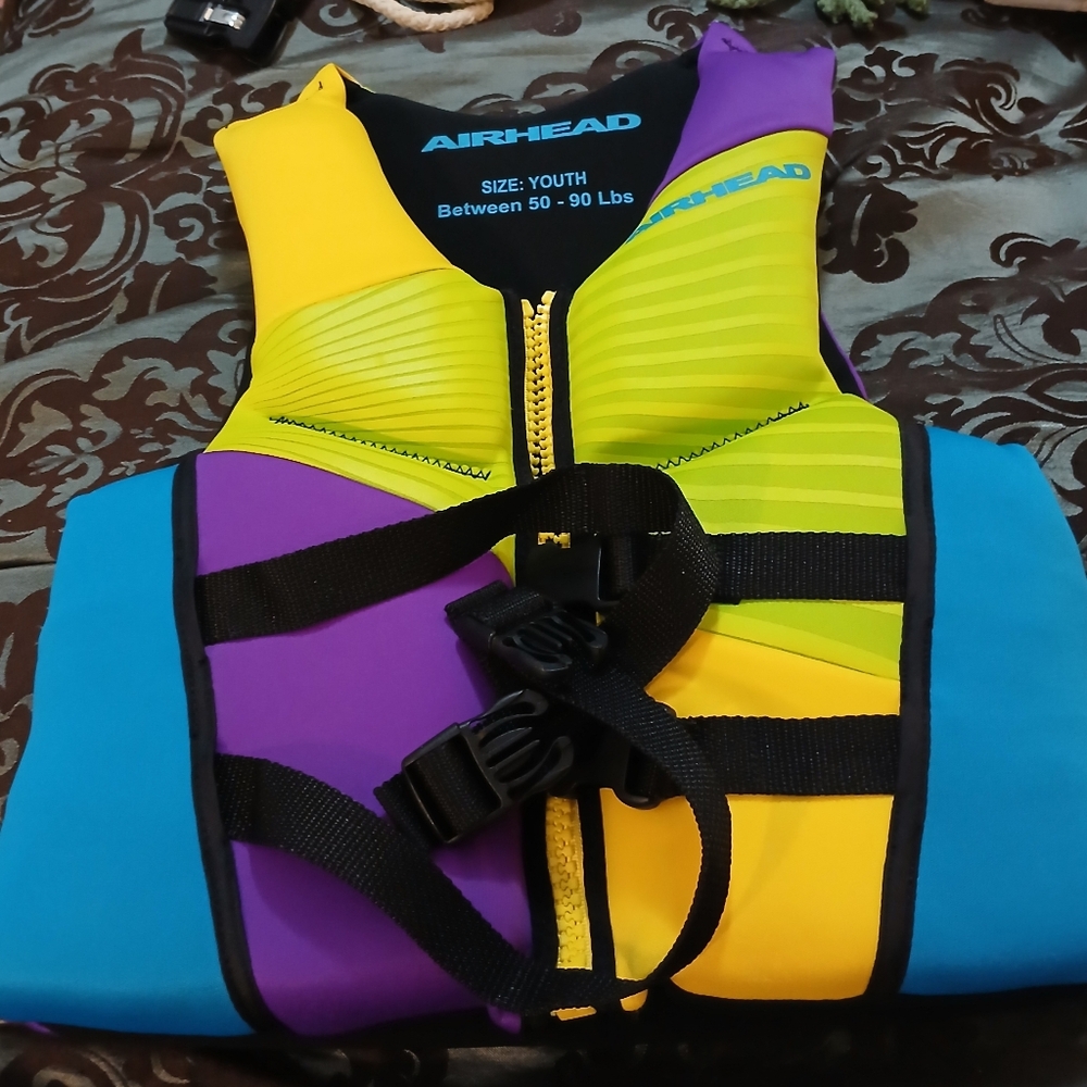 NWOT Airhead Youth Life Vest - Purple, Yellow, Blue. Item Not Used. - Picture 3 of 6